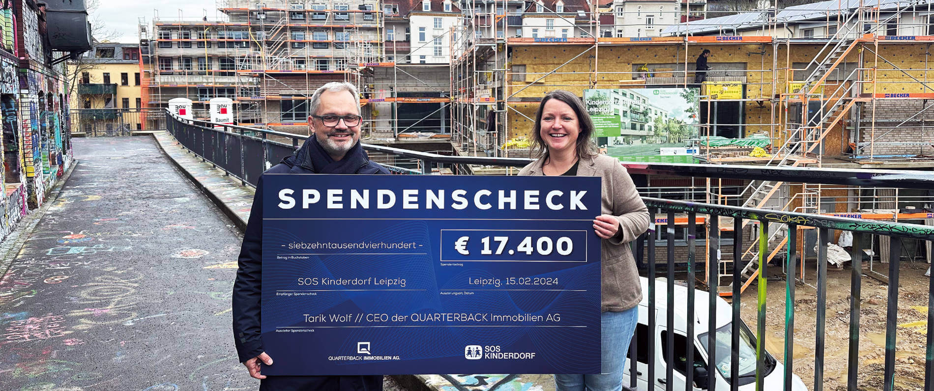 QUARTERBACK Immobilien AG übergibt Spendencheck an SOS-Kinderdorf